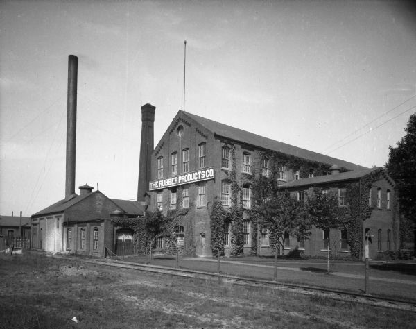 View towards the ivy-covered factory of the Rubber Products Company, founded in 1910.