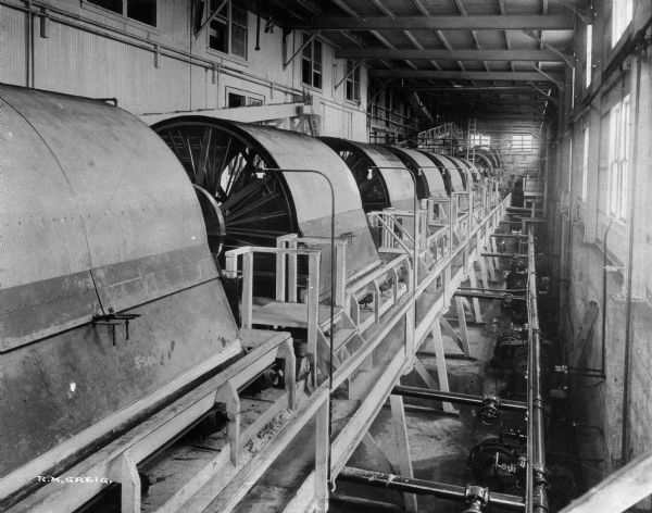 By 1919, the Washoe Reduction Works at Harding Mills could boast that its 585-foot smokestack was the tallest masonry structure in the world and that the smelter-refining complex constituted the world’s largest nonferrous processing plant.  The oliver filters shown here are used in the refining of copper.
