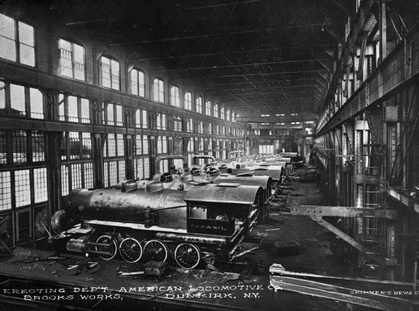 The erecting department at Brooks Works of the American Locomotive Company, founded in 1901.  Photograph published by Skinner's News Company.