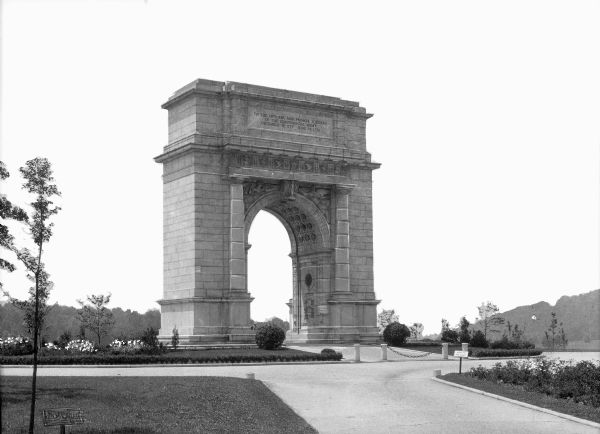 A view of the United States Memorial Arch, completed in 1917. The arch was designed by Paul Philippe Cret, and exhibits the neoclassical style. The arch reads, "To the officers and private soldiers of the Continental Army, December 19, 1977 - June 19, 1778."