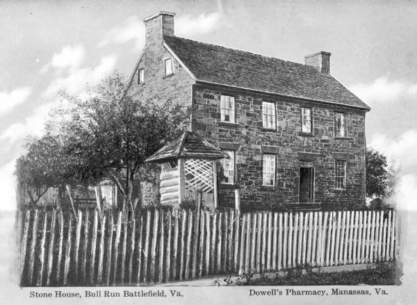 A fence surrounds an old stone house and trees at Bull Run Battlefield. Caption reads: "Stone House, Bull Run Battlefield, Va." 