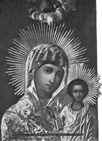 View of a painting of the Madonna and Son, attributed to Vladimir Lukich Borovikovsky (1758-1826). The painting belongs to the Cathedral of Saint Michael the Archangel, a Greek Orthodox Church built in 1848. Caption reads: "Madonna in Greek Church, Sitka, Alaska."
