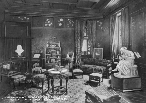 Interior of College Hall, the first building at Wellesley College, founded in 1870. The view includes statues and ornate decor in the Browning Room. Caption reads: "Browning Room, College Hall, Wellesley College."