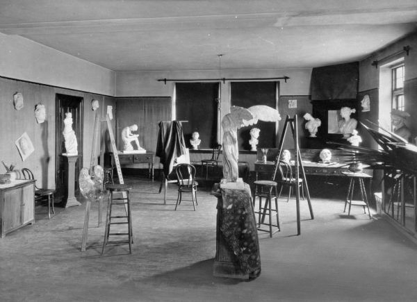 Interior of the art room at the Holy Rosary Academy, founded in 1886. The room is filled with paintings and sculptures.