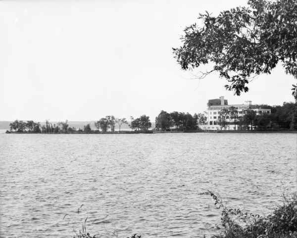 View of Lawsonia Country Club Hotel from the opposite bank of Green Lake. The hotel opened to the public in 1930.