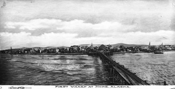 View of First Wharf from the Bering Sea.  A railroad bridge leads to the shoreline.