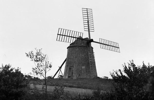 View of the Old Mill at Wychmere Harbor, known as Nickerson's Mill.  The windmill was moved to Dennisport in 1903.