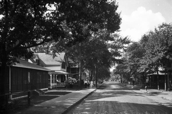 View down West Central Avenue, a residential street lined with homes.