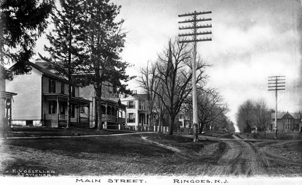 View down Main Street with residences set back from the street.