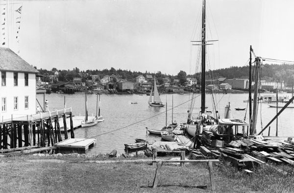 View of the harbor, crowded with boats.