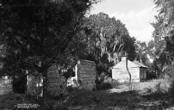 View of the slave quarters at West Point Plantation.  Copyright 1910 by Fleming & Bryant, Brunswick, GA.