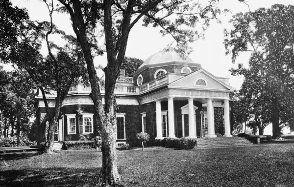 Exterior view of Monticello, built in 1769 by Thomas Jefferson.  The residence features a colonnaded front porch and a central dome.