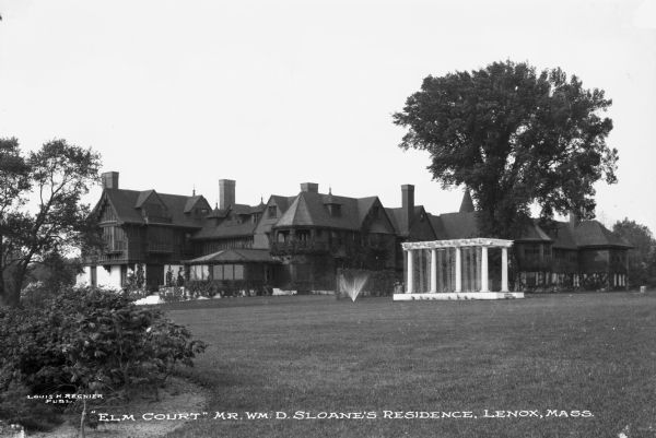 View of Elm Court, the largest American Shingle Style home in the United States. The residence was built by William Douglas Sloane and Emily Vanderbilt in 1886, along with architects Peabody and Stearns.  Published by Louis H. Regnier.