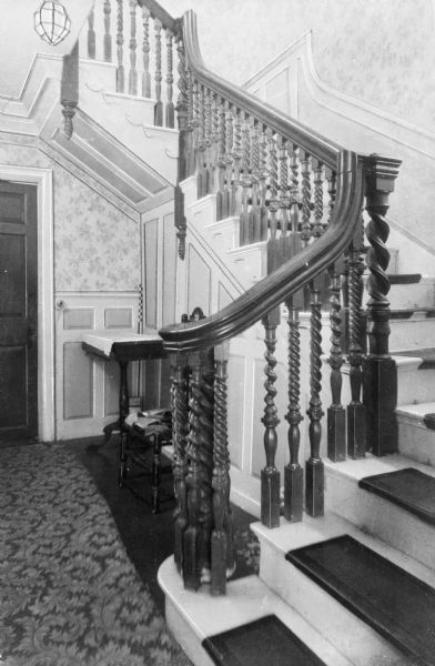 Interior view of the Stanton Homestead, built in 1672.  The stairway features elaborately carved balusters.