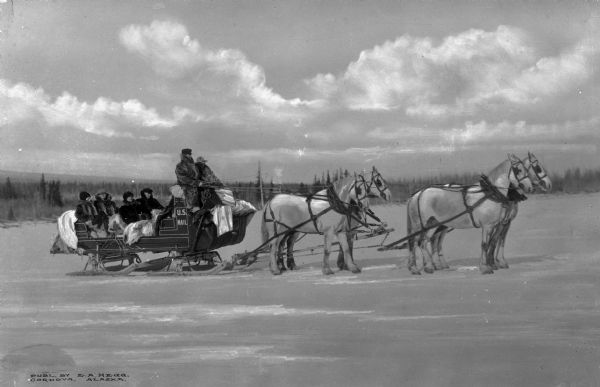 View of a horse-drawn stagecoach of the Chitina and Fairbanks Stage Line. Published by E.A. Hegg.