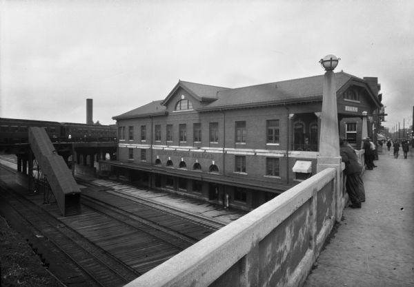 Exterior view of the Illinois Central Railroad Station, from a bridge crossing over the tracks, built in 1918.