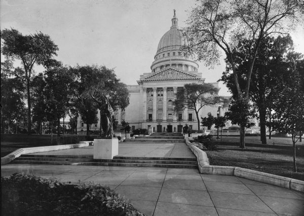 North Hamilton walkway view of Wisconsin State Capitol, featuring the "Forward" statue. The North Pediment can be seen in the background.