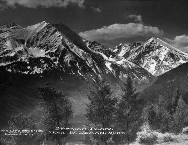 A view of the Spanish Peaks from the Bozeman vicinity. Caption reads: "Spanish Peaks Near Bozeman Montana."
