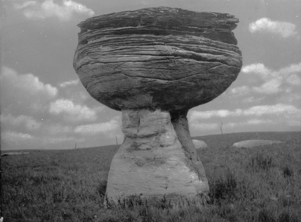 A mushroom-shaped rock.