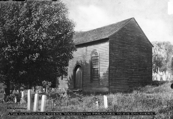 The old church where Washington preached to his soldiers, the surrounding area is likely a cemetery. Caption reads: "The Old Church where Washington preached to his soldiers."