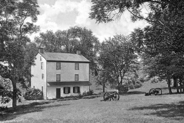 A view of the house that was General Varnum's headquarters. Two cannons are on the lawn.