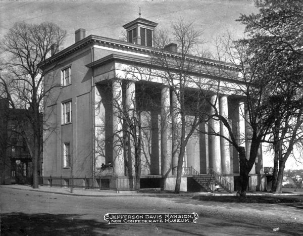 View across street toward the Jefferson Davis mansion. Caption reads: "Jefferson Davis Mansion, now Confederate Museum."