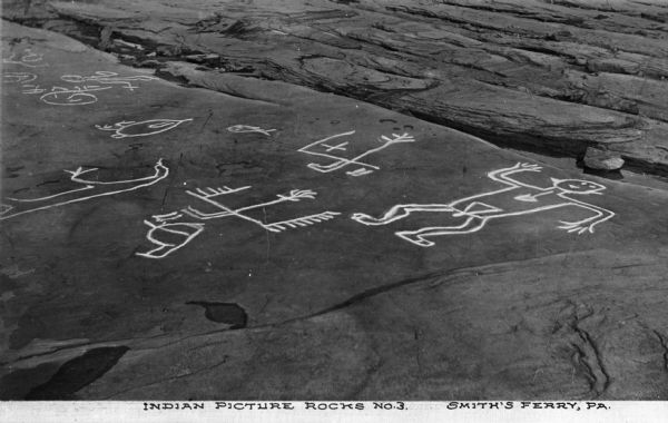 An elevated view of Native American picture rocks, also known as petroglyphs. Caption reads: "Indian Picture Rocks No. 3. Smith's Ferry, PA."
