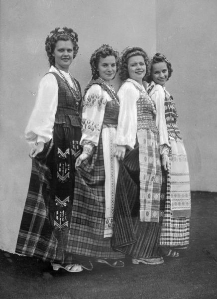 A portrait of four Lithuanian women in costumes for the World's Fair in 1939.