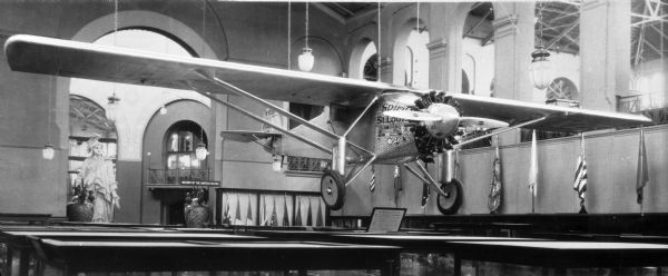 Indoor view of the Spirit of Saint Louis, the first airplane to cross the Atlantic Ocean in a non-stop flight, displayed in the Smithsonian Institute. The plane was piloted by Charles Lindbergh.