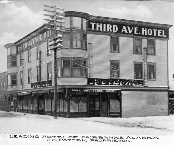 View across street toward the Third Avenue Hotel. Caption reads: "Leading Hotel of Fairbanks, Alaska, J. H. Patten, Proprietor."