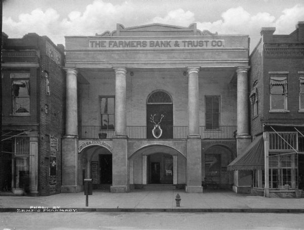 View from street toward the exterior of the Farmers Bank and Trust Company.