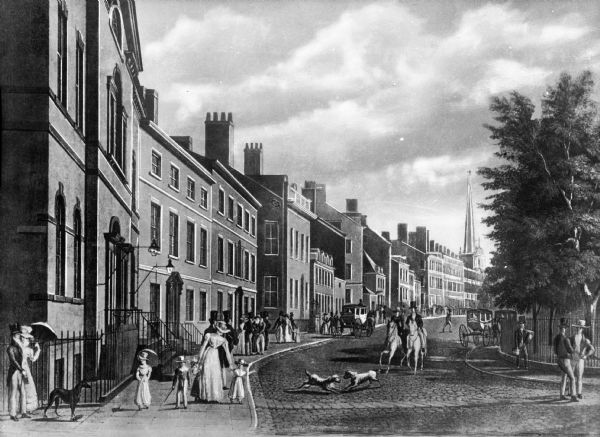 A street scene of early New York City, featuring a building-lined street, with people walking, riding horses, and riding in carriages. Also pictured are numerous dogs, and a church in the distance. The figures appear to be illustrations added to the original photograph.