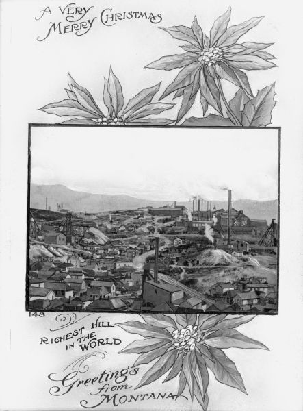 Christmas greeting card featuring a view of a mining town with smokestacks, gravel piles, houses, large buildings and distant mountains. Surrounding the photograph are illustrated poinsettias. Captions read: "A Very Merry Christmas, Richest Hill in the World. Greetings From Montana."