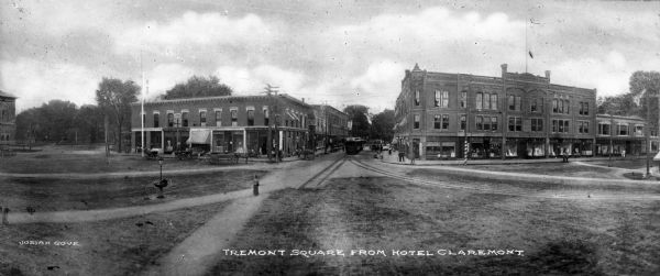 View of Tremont Square from Hotel Claremont with large buildings in background. Caption reads: "Tremont Square from Hotel Claremont."