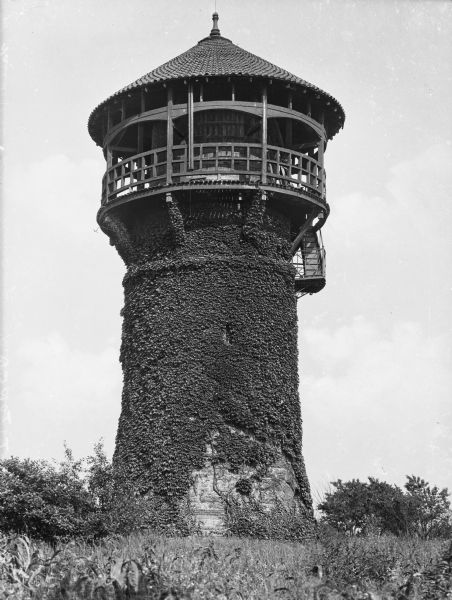 View of Vanderbuilt Tower, a round ivy-covered observation tower.