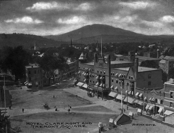 Elevated view from a nearby rooftop of Hotel Claremont and Tremont Square with hills in the background. Caption reads: "Hotel Claremont and Tremont Square."