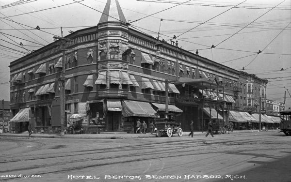 View across intersection toward the Hotel Benton. Caption reads: "Hotel Benton, Benton Harbor, Mich."