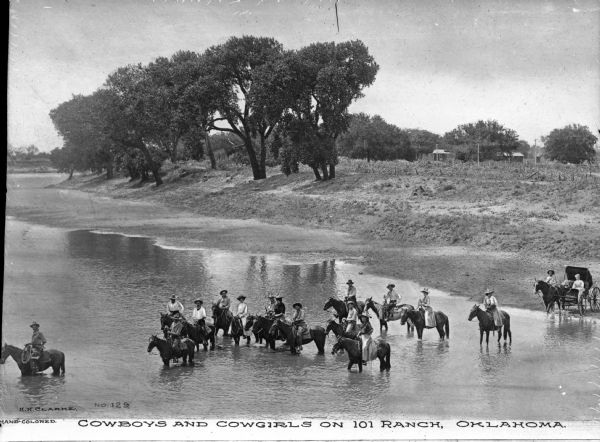 Elevated view of men and women on horseback in a strem. On the shoreline at the right is a horse-drawn carriage . Trees are further down the shoreline, and farm buildings are in the background, with a garden or small crop field in front of the buildings. Caption reads: "Cowboys and Cowgirls on 101 Ranch, Oklahoma."

In 1975 the ranch was designated as a National Historic Landmark.
