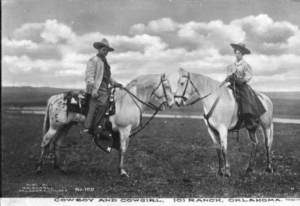 Portrait of a cowgirl and cowboy on horseback. Their horses are facing each other as they look at the camera. A lake or river is in the background. Caption reads: "Cowboy and Cowgirl. 101 Ranch, Oklahoma."

In 1975 the ranch was designated as a National Historic Landmark.