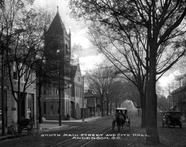 South Main Street and City Hall. On the left side of the street, a business sign reads: "The Daily Mail." Caption reads: "South Main Street and City Hall, Anderson, S.C."