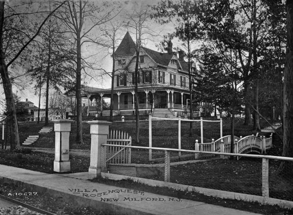 View of the Villa Rosenquest residence and grounds. Caption reads: "Villa Rosenquest, New Milford, N.J."