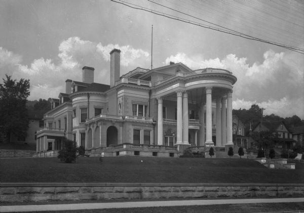 Front view of the S.R. Dresser mansion and yard. Solomon Robert Dresser (1842-1911) was the founder of Dresser, Inc., a natural gas and oil company.
