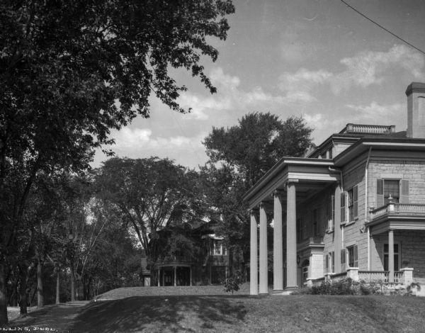 A view of the the mansion of I.W. Wills. Another home is next door.