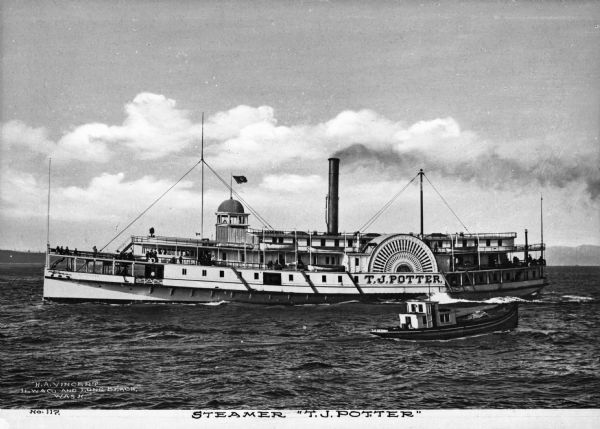 View of the "T.J. Potter" steamship in the water near Long Beach. The ship features a paddle wheel and a smokestack. "T.J. Potter" ispainted on the side of the ship and passengers are on the decks. A tugboat is in the water nearby, with a painted sign reading, (illegible): "of Astoria." Caption reads: "Steamer 'T.J. Potter.'"