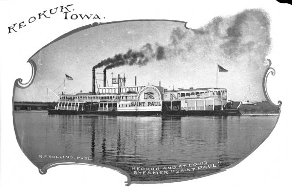 Steamship "Saint Paul" on the Mississippi River near Keokuk. Sign painted on the ship read: "St. Louis, Quincy & Keokuk Jo Line Saint Paul." Postcard reads: "Keokuk, Iowa" and "Keokuk and St. Louis steamer 'Saint Paul.'"