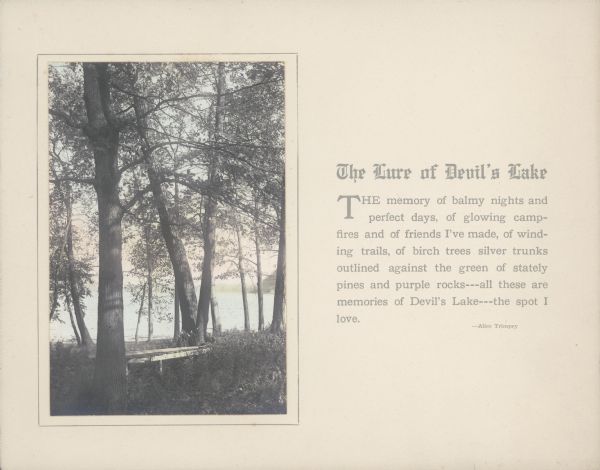 A hand-tinted photograph of a scene along the wooded shore of Devil's Lake is mounted on a piece of beige paper. The scene features an old section of a wooden pier which has been removed from the water. A short essay by Alice Kent Trimpey, the photographer's wife, is printed alongside.