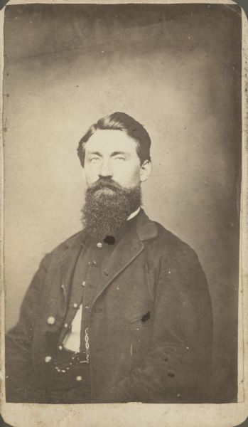 Carte-de-visite of a waist-up studio portrait of Orin J. Whitman, 9th Wisconsin Artillery.
