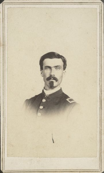 Vignetted carte-de-visite portrait of 2nd Lieutenant William J. Duffield, Company D, 4th Wisconsin Cavalry. 