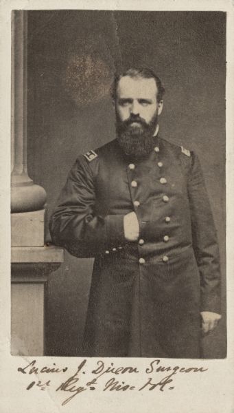 Three-quarter length carte-de-visite portrait of Lucius J. Dixon, surgeon for the 1st Wisconsin Infantry.