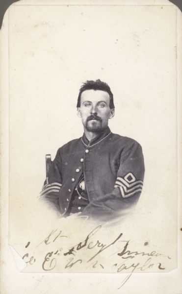 Waist-up carte-de-visite portrait of 1st Sergeant Simeon Taylor, Company E, 13th Wisconsin Infantry. He was eventually promoted to 1st Lieutenant.